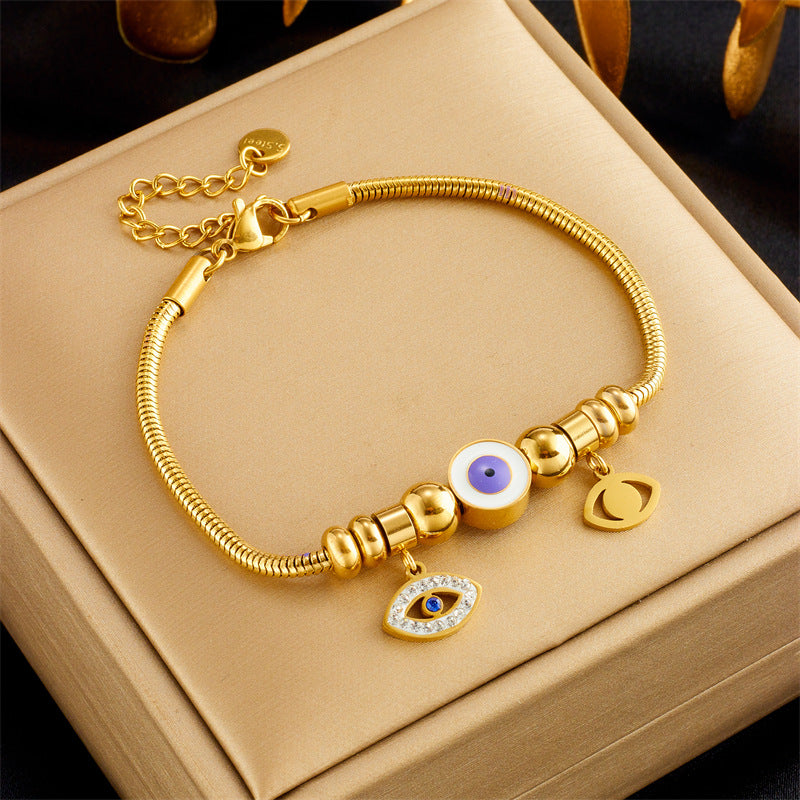 Bracciale alla moda minimalista in acciaio al titanio con ciondoli a cuore e farfalla e intarsio di strass, per donne
