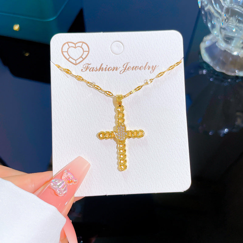 Collana Pendente a Croce Geometrica Esotica da Donna in Acciaio al Titanio con Intarsio di Zirconi e Placcatura in Oro