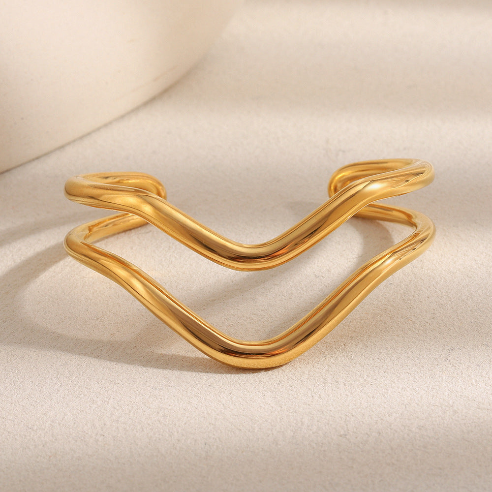 Minimalist Twisted Line Stainless Steel Bracelet for Women with 18K Gold Plating