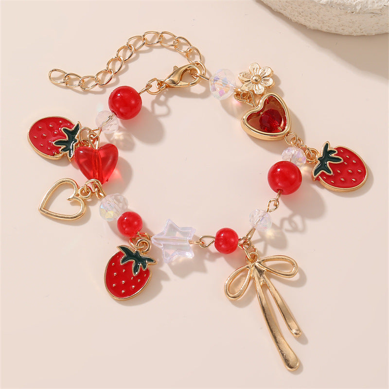 Pulsera con dije de lazo de corazón de cereza dulce para niñas, hecha de resina con detalles artesanales