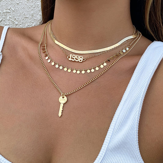 Collar vintage punk con colgante geométrico de llave para mujer con detalles de pedrería y cadena de serpiente en aleación con acabado chapado