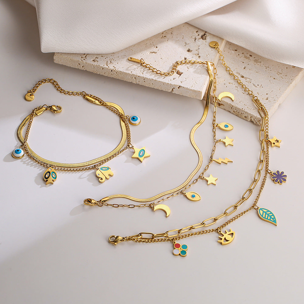 Fashionable Geometric Titanium Steel Double-Layer Bracelet for Women with Gold Plating and Irregular Elephant Eye Floral Leaf Design
