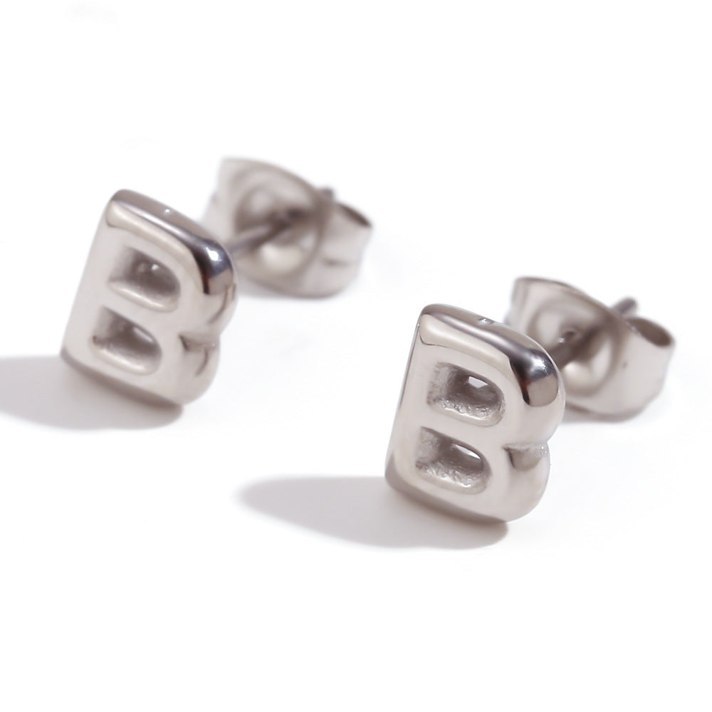 Orecchini a perno da donna con lettera geometrica moderna minimalista in acciaio al titanio placcato oro 18K