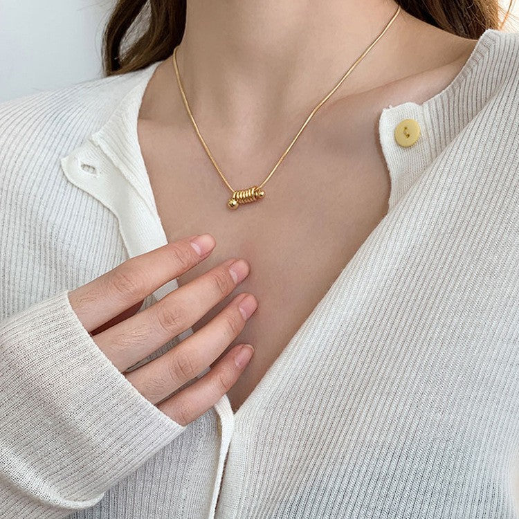Minimalist Golden Titanium Steel Spiral Snake Chain Necklace for Women with Geometric Design and Clean Aesthetic