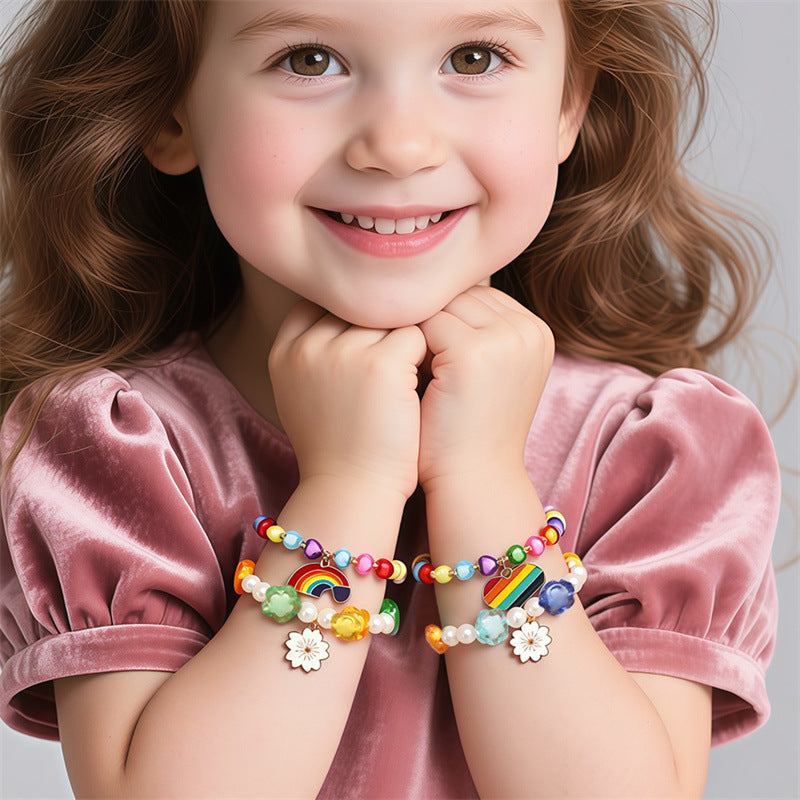 Bracciale per Bambine con Ciondolo a Cuore Floreale e Arcobaleno in Resina Plastica con Perline e Stella