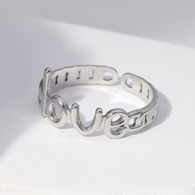 Anello aperto regolabile in acciaio al titanio con placcatura, per donna, con design a lettera d'amore minimalista