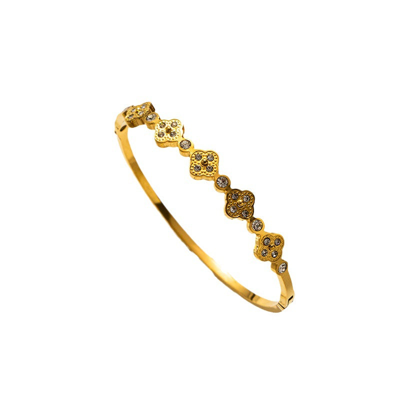Bracciale di lusso a forma di trifoglio in acciaio al titanio da donna con intarsio di strass e finitura placcata sottovuoto