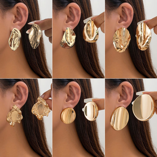 Pendientes de botón minimalistas de aleación pulida, redondos y geométricos, con textura de onda irregular para mujer