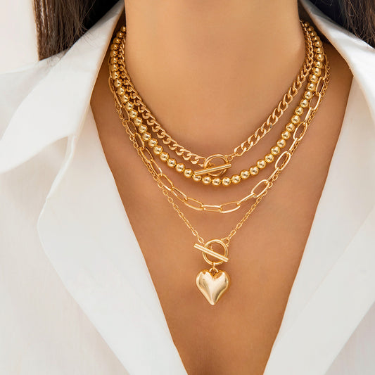 Collana da donna in lega a cuore geometrica dolce e audace con finitura placcata