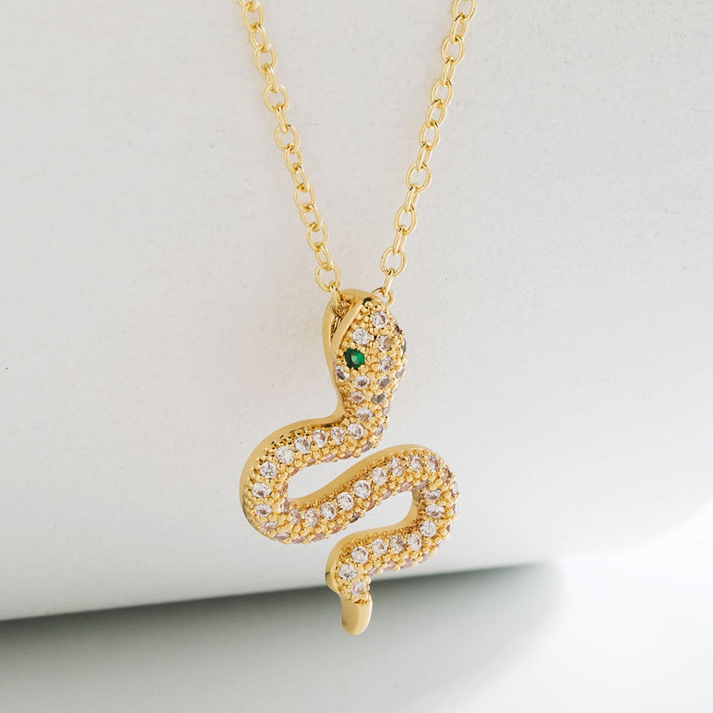 Minimalist Geometric Snake Pendant Necklace for Women in Copper with 18K Gold Plating and Micro-Paved Zirconia