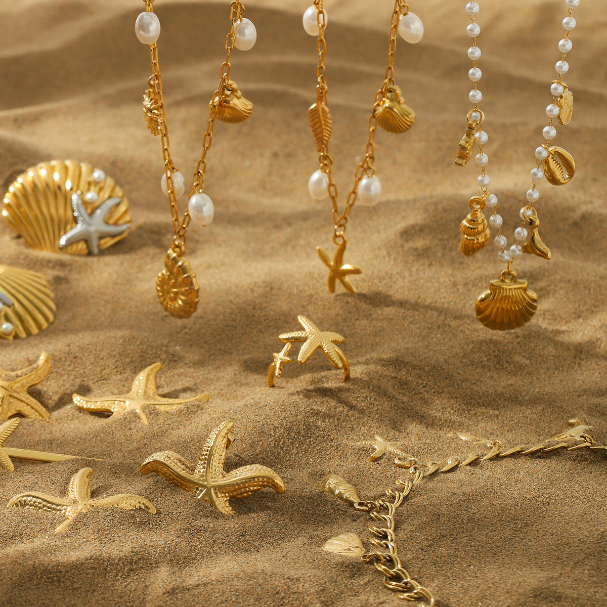 Set di collane minimalista con stelle marine e conchiglie, ispirato all'oceano, in acciaio inossidabile con finitura placcata per donne