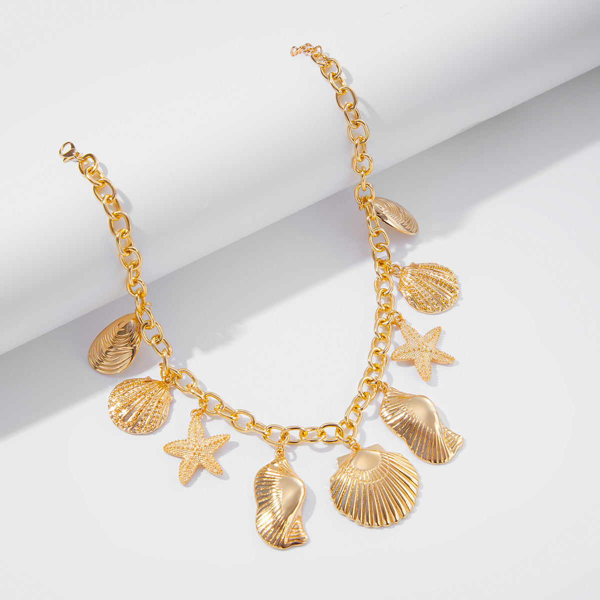 Collana da donna con ciondolo a stella in lega, stile vacanza, con nappa e finitura placcata