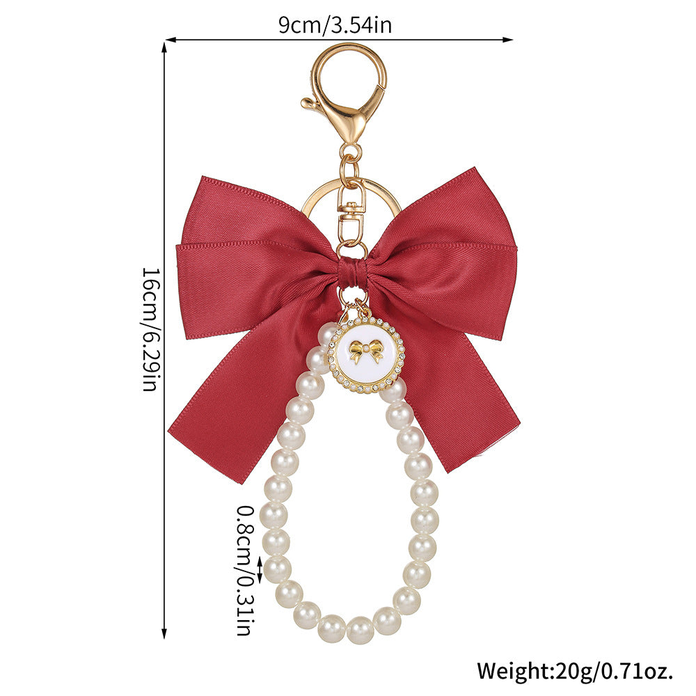 Sweet Cartoon Bow Pearl Zinc Alloy Keychain Bag Charm