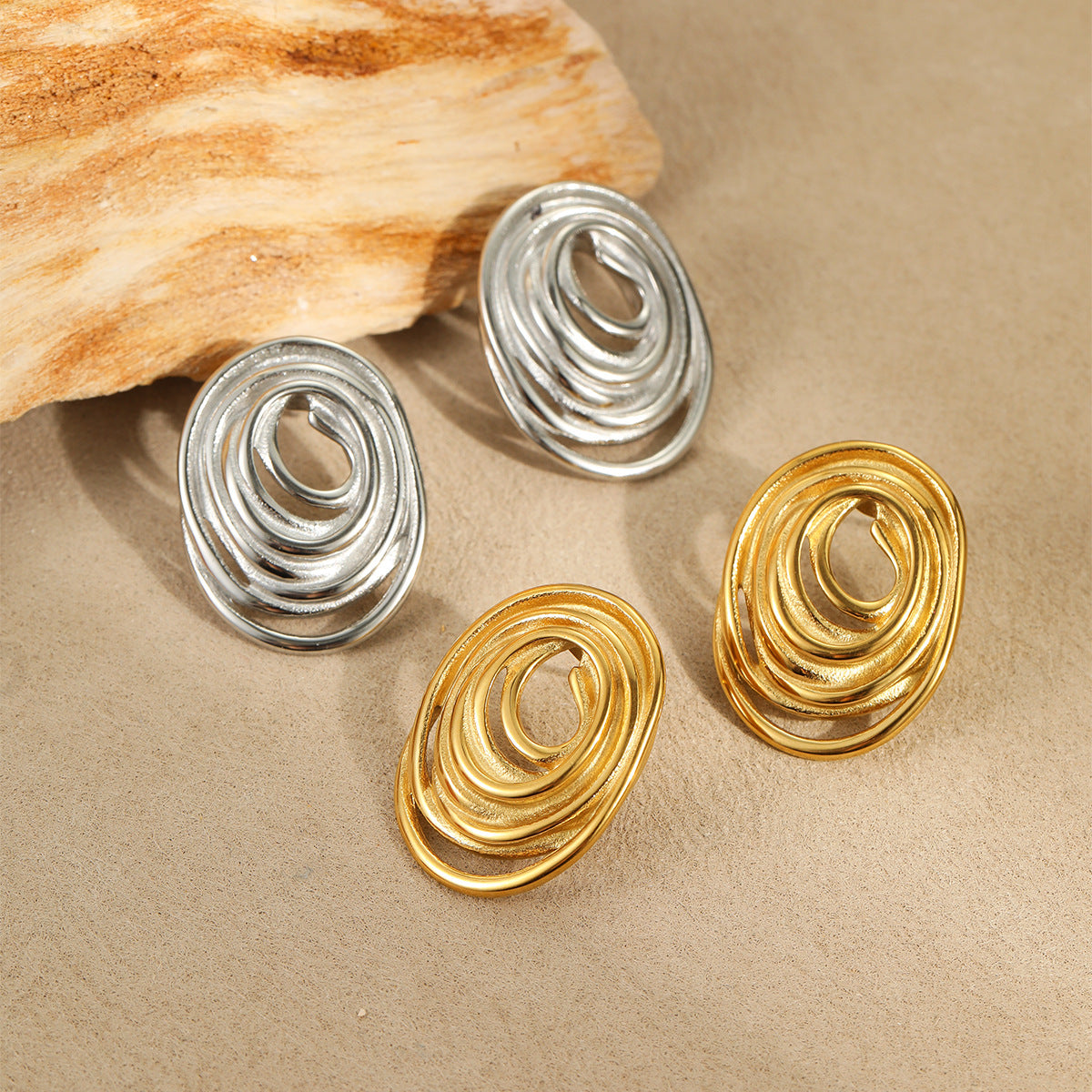 Orecchini da donna minimalisti in acciaio inossidabile con spirale geometrica e finitura placcata