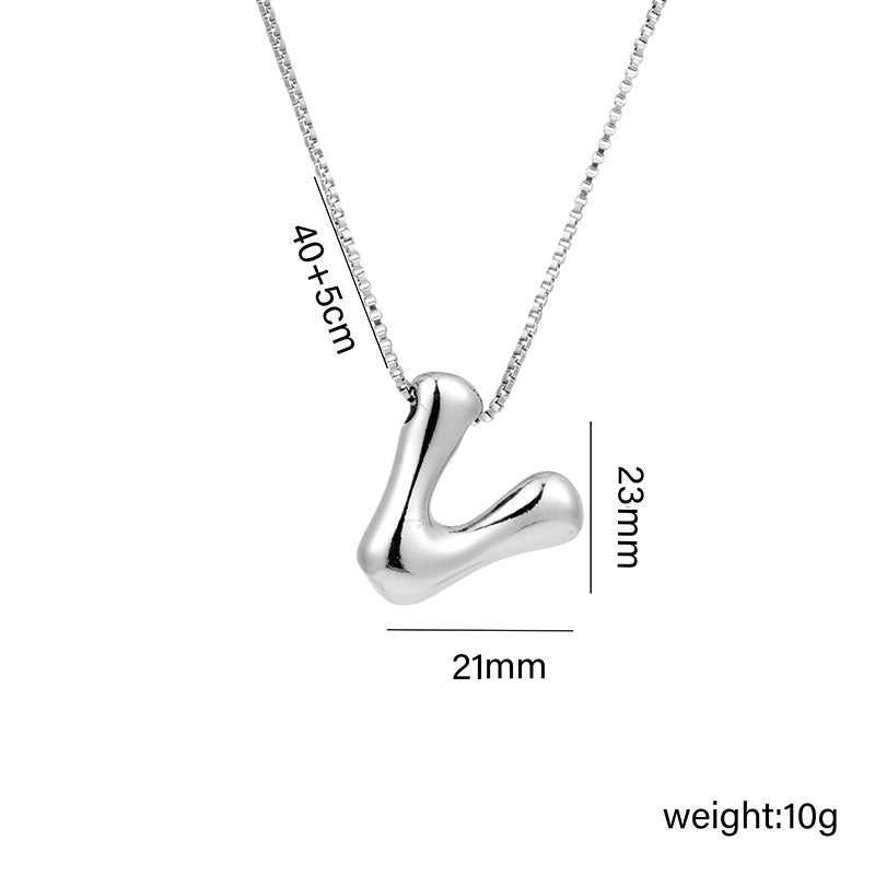 Collar con colgante de acero titanio con forma de letra minimalista y chapado en oro para mujer
