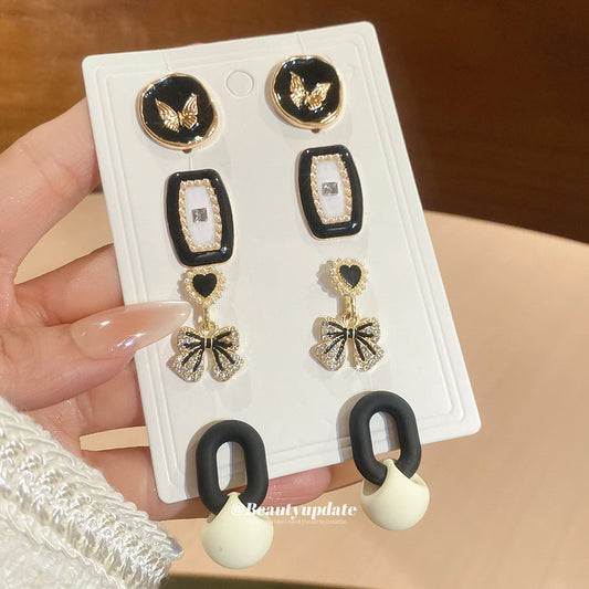 Pendientes de perlas con forma de lazo, estilo retro elegante, con incrustaciones de diamantes de imitación y postes de acero para mujer