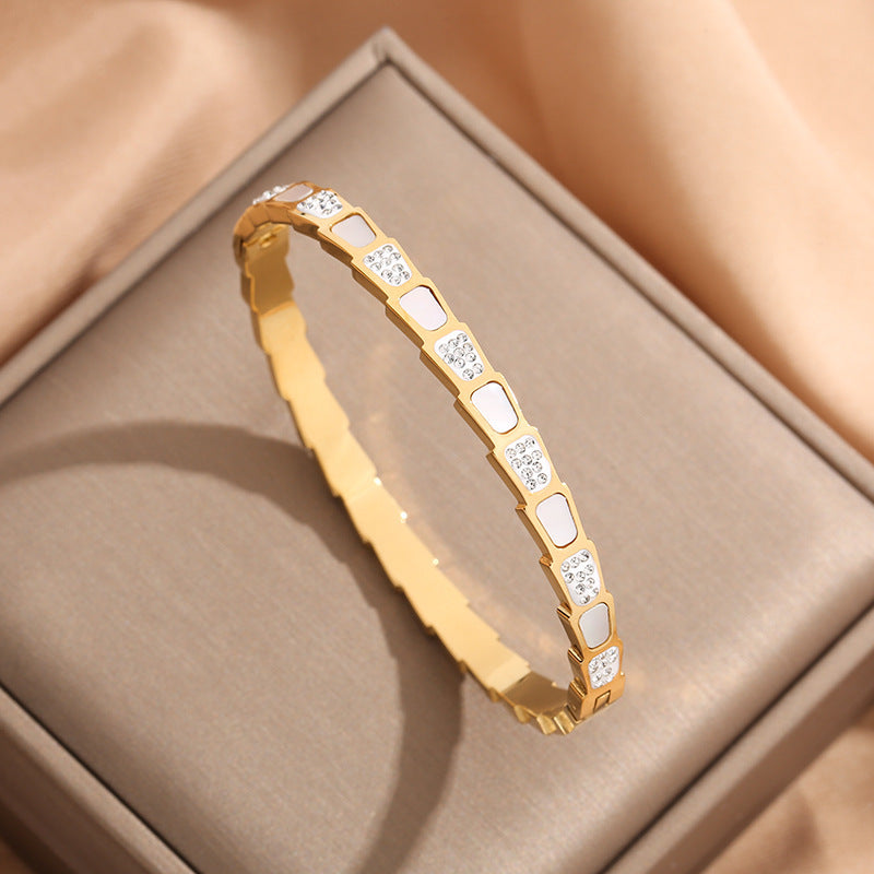 Bracciale Donna Minimalista in Titanio Placcato a Forma di Serpente con Zirconi