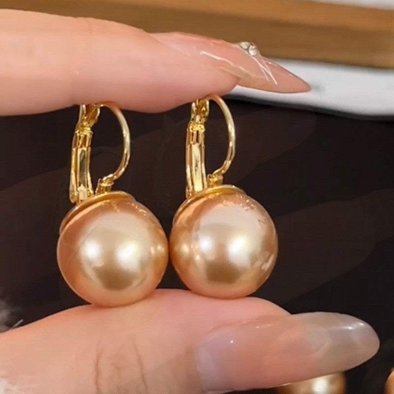Orecchini da donna vintage eleganti a forma di stella geometrica con perle simulate e zirconi, perni in acciaio placcato