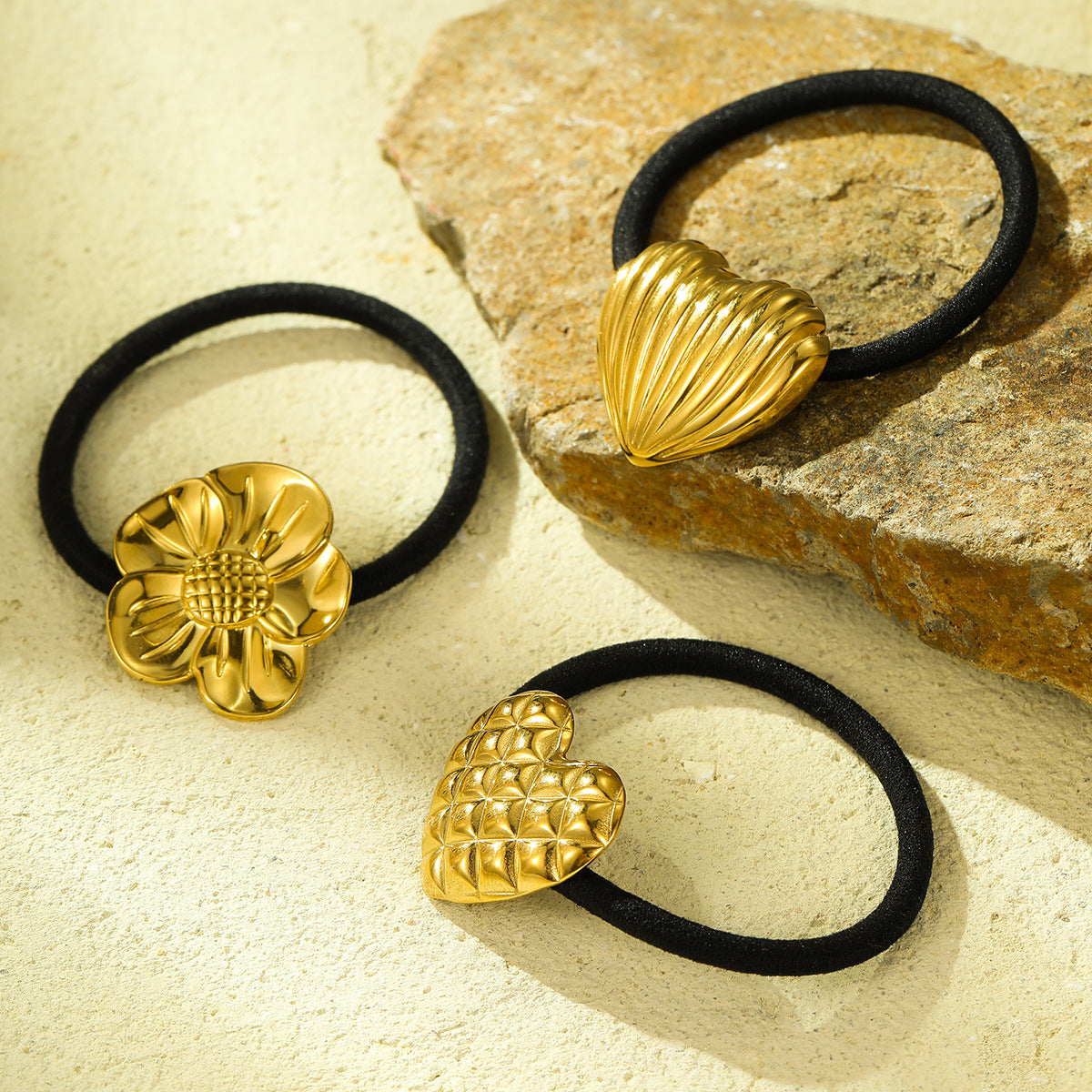 Fermacoda a forma di cuore e girasole in acciaio e titanio minimalista con finitura placcata per coda bassa, accessorio moda ad alta elasticità