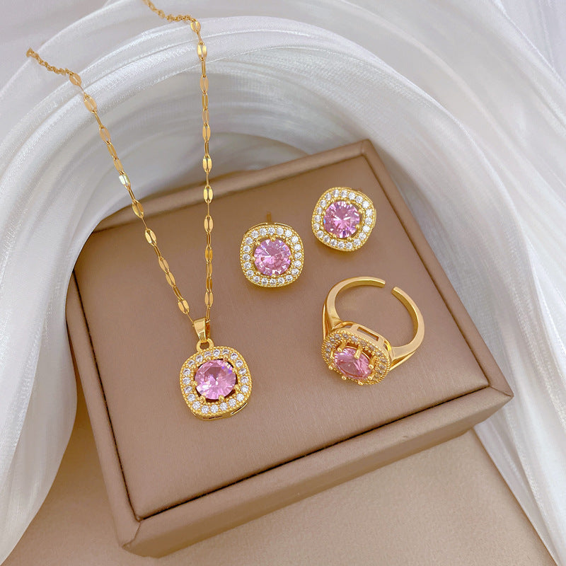 Set di collana, orecchini e anello in acciaio al titanio con design geometrico di lusso