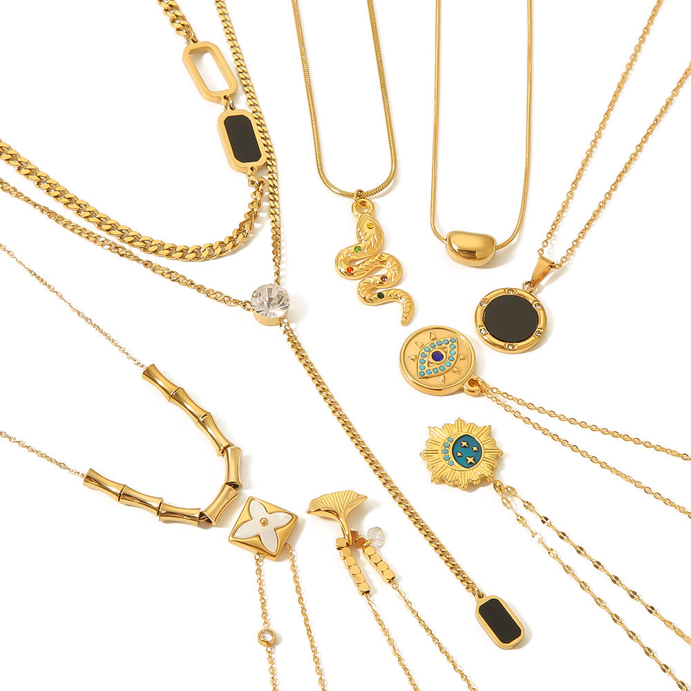 Minimalist Stainless Steel Snake-Eye Bamboo-Shaped Pendant Necklace for Women with 18K Gold Plating and Zircon Inlay