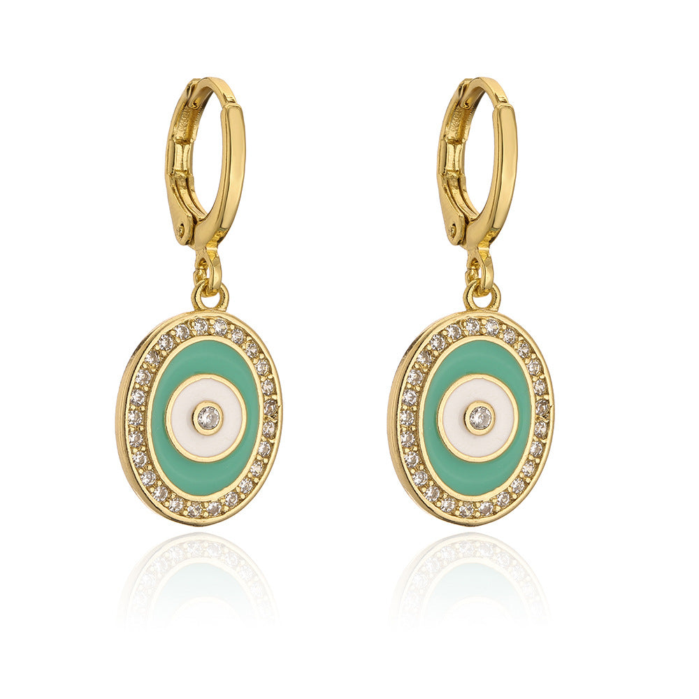 Orecchini geometrici in rame a forma di occhio con placcatura in oro 18 carati e accenti in zirconia smaltata colorata