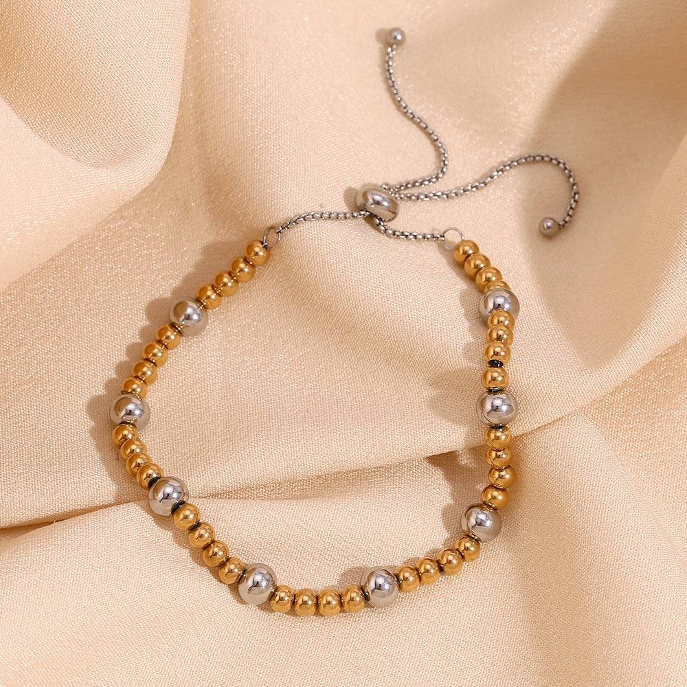 Elegante bracciale geometrico minimalista in acciaio inossidabile con placcatura in oro 18 carati e design regolabile con perline per donna