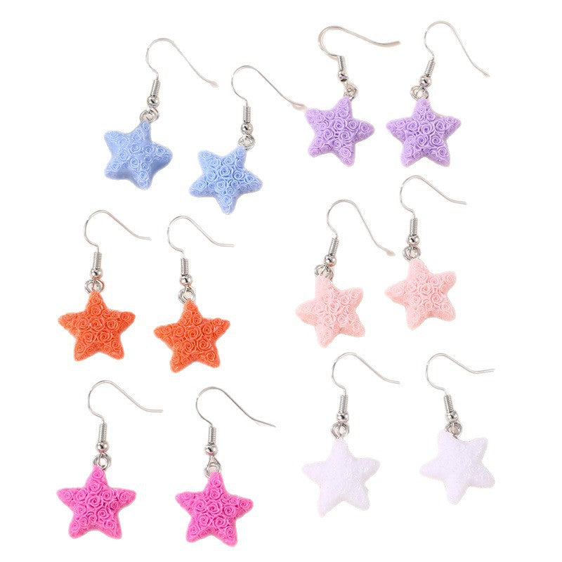 Set de aretes infantiles minimalistas con corazón floral, estrella y moño para niñas de 3 a 10 años, aretes de plástico y resina con incrustaciones de perlas