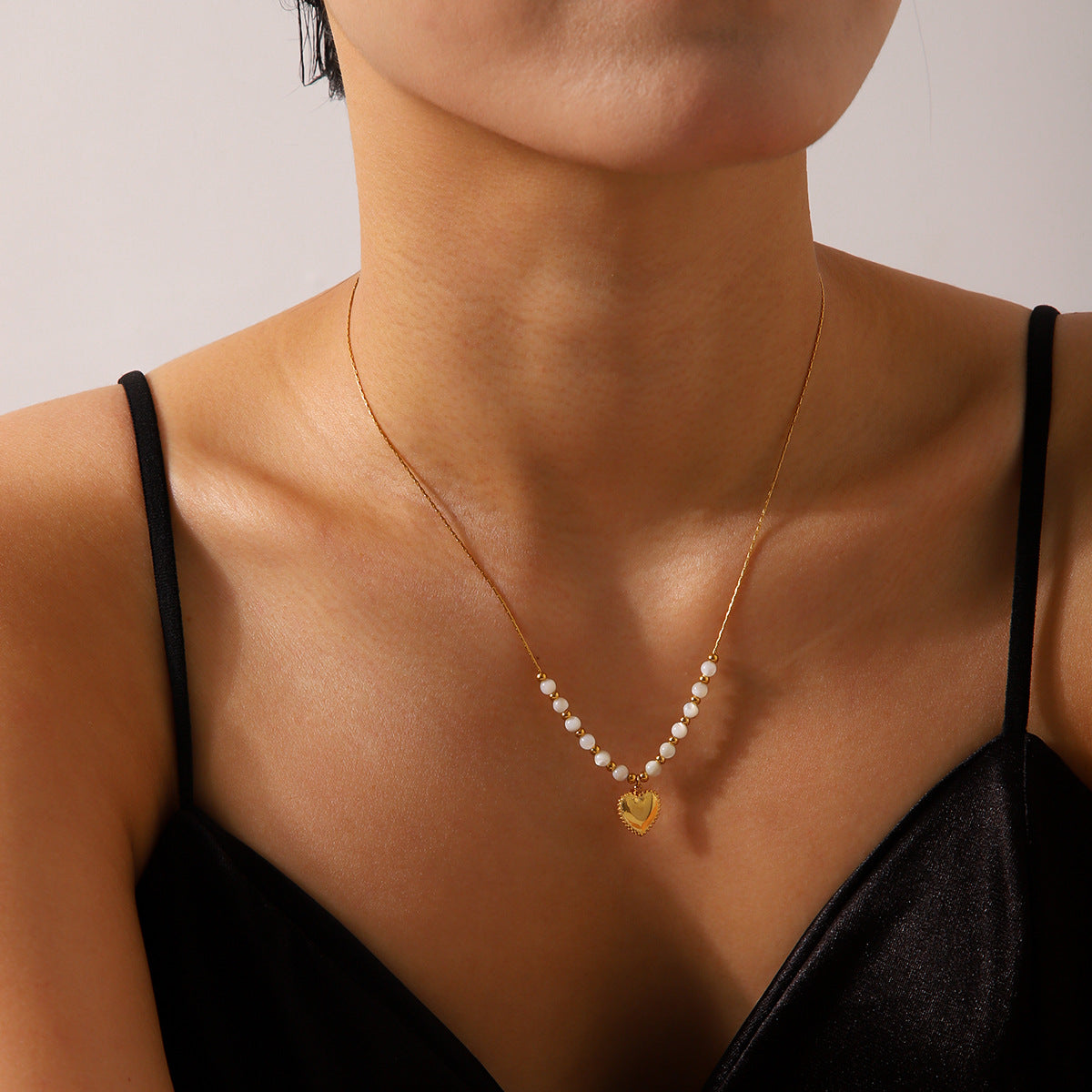 Minimalist Heart-Shaped Stainless Steel Pendant Necklace with Titanium Steel Charm, Electroplated Finish, Delicate Clavicle Chain for Women