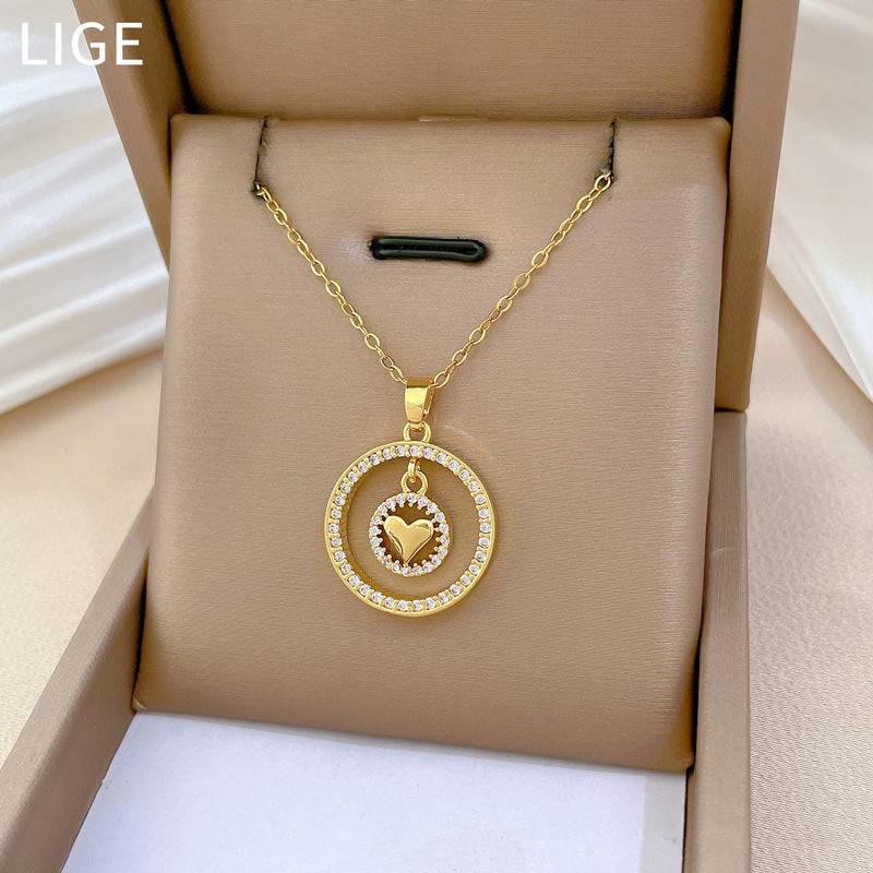Collana con pendente a cuore circolare a doppio strato minimalista da donna in acciaio inossidabile con intarsio di strass, elegante catena per clavicola