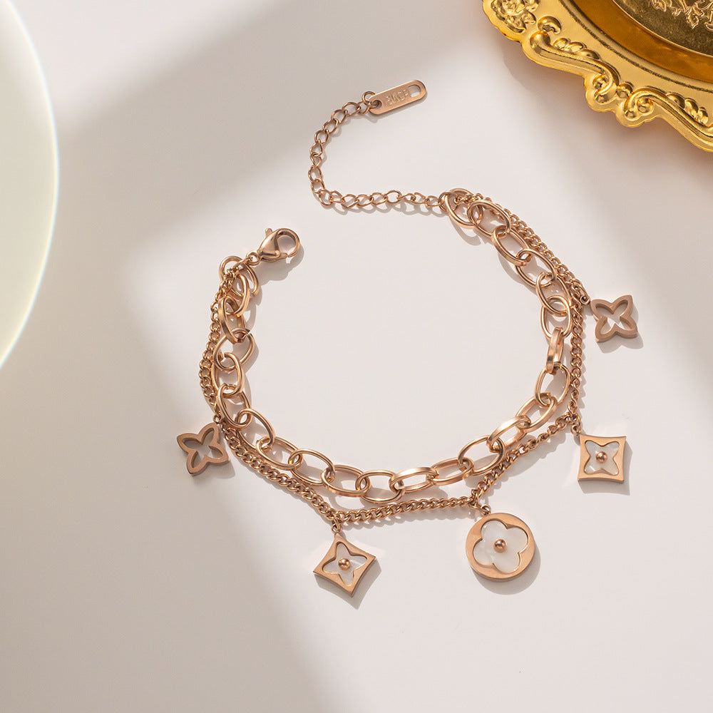 Bracciale minimalista in acciaio al titanio a forma di trifoglio con finitura placcata da donna