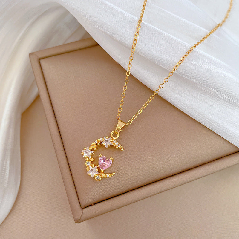Collar con colgante de lujo de acero de titanio dulce y fresco con forma de corazón, estrella y luna de diamantes de imitación para unisex