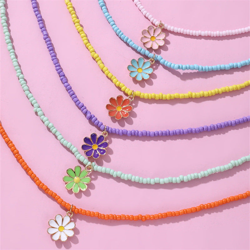Precioso collar con colgante de lazo en tonos pastel para mujer, con abalorios de cristal y dije de aleación en una delicada cadena
