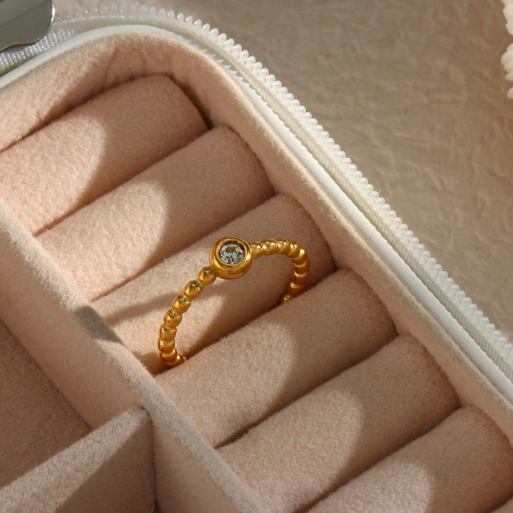 Minimalist Geometric Stainless Steel Ring with 18K Gold Plating and Cubic Zirconia Bead Accent