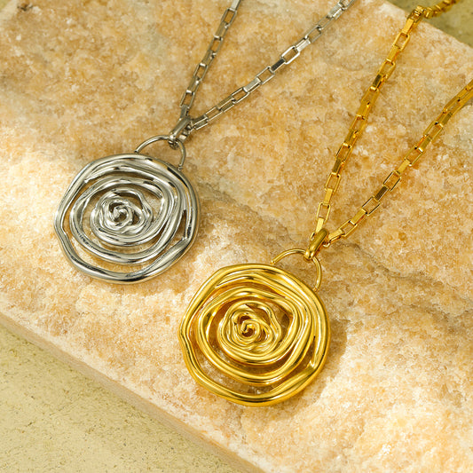 Collar minimalista con colgante de espiral de titanio y acero con acabado chapado para mujer
