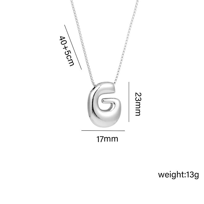 Collar con colgante de acero titanio con forma de letra minimalista y chapado en oro para mujer