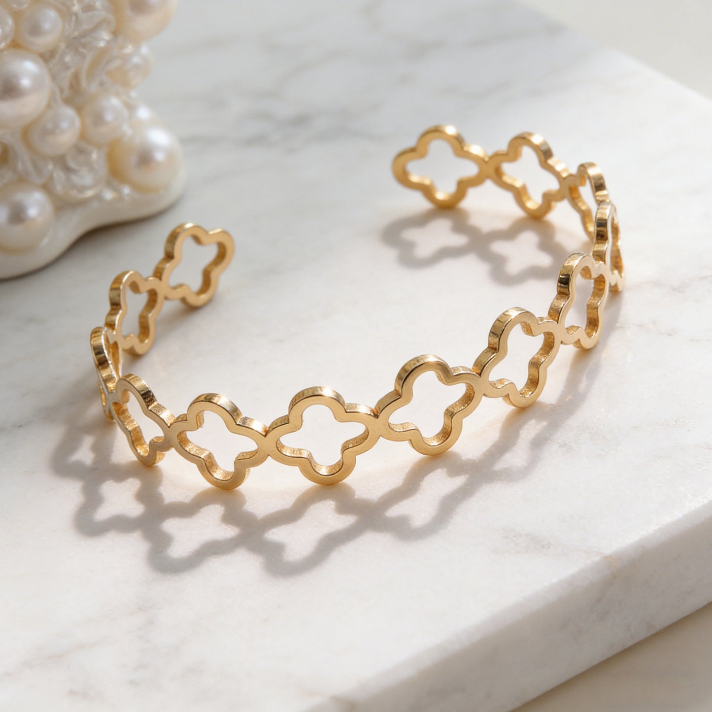 Elegant 18K Gold Plated Stainless Steel Hollow Four-Leaf Clover Cuff Bracelet