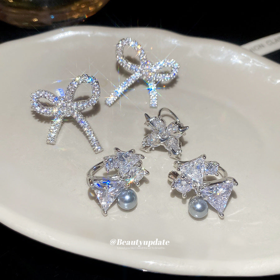 Orecchini a clip di lusso a forma di fiocco geometrico da donna con intarsio in zircone in rame