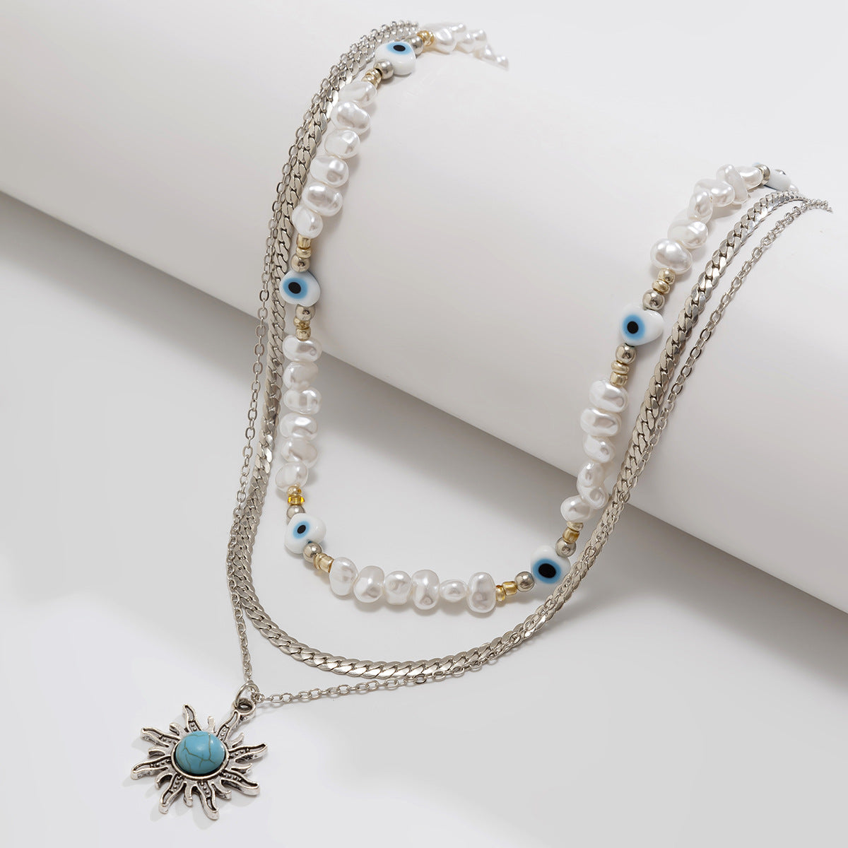 Collar con colgante vintage gótico de ojo turco con motivos solares, detalles de perlas irregulares y cadena de aleación multicapa con diseño geométrico