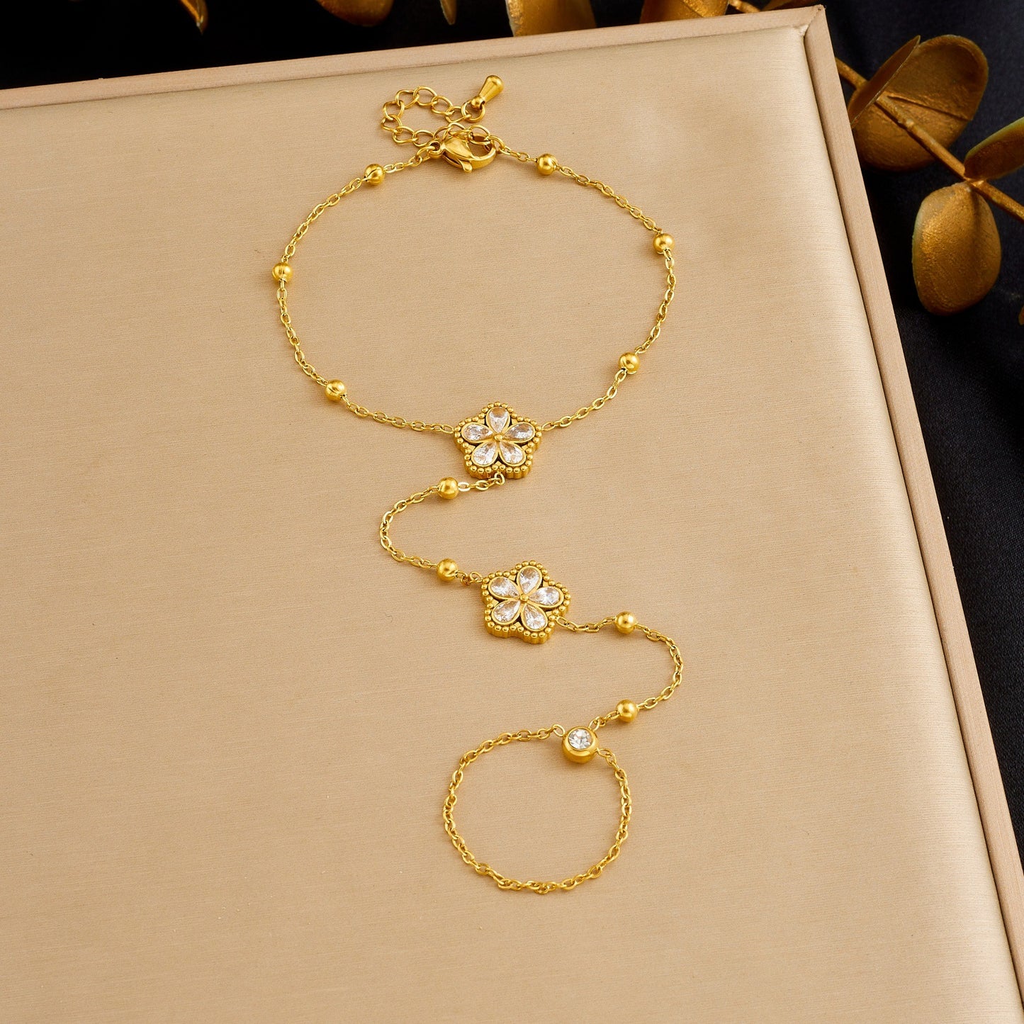 Minimalist Elegant Gold Plated Stainless Steel Floral Rhinestone Hand Chain with Tassel