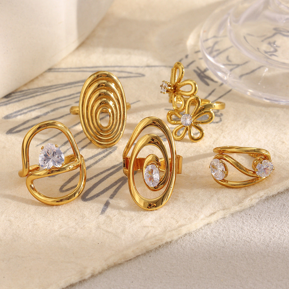 Anillo Minimalista Geométrico de Acero Inoxidable con Baño de Oro de 18K y Detalles Florales en Espiral de Circonita para Mujer