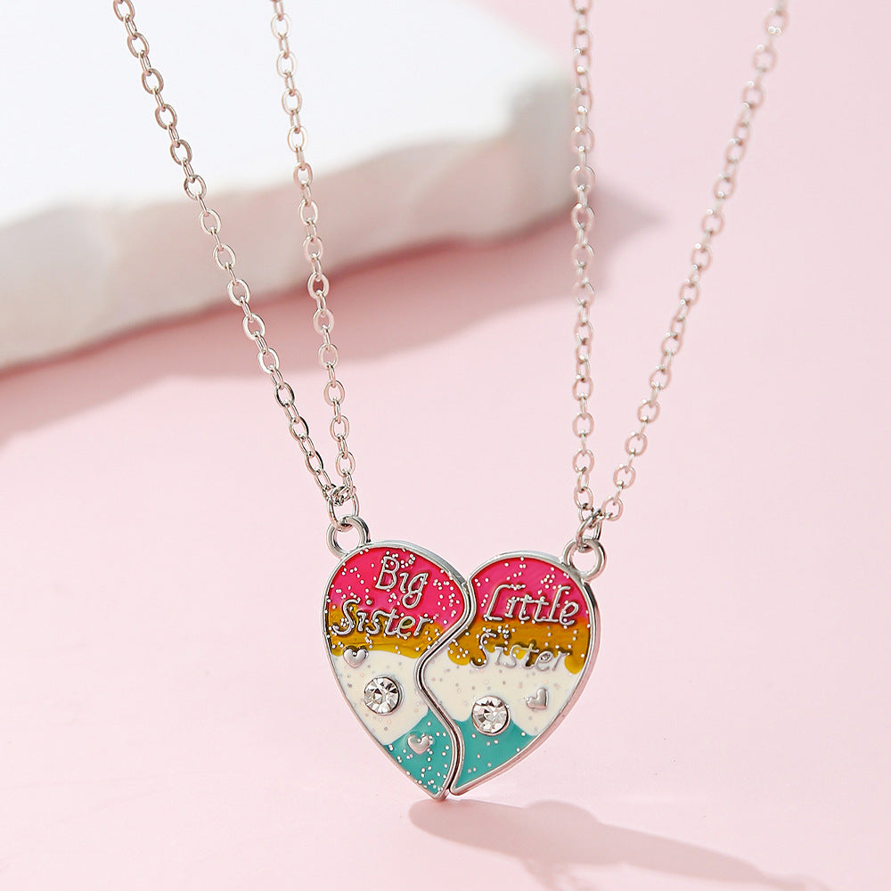 Precioso collar de aleación con forma de corazón y acabado esmaltado para niños, diseño de cadena cruzada con detalles de diamantes de imitación