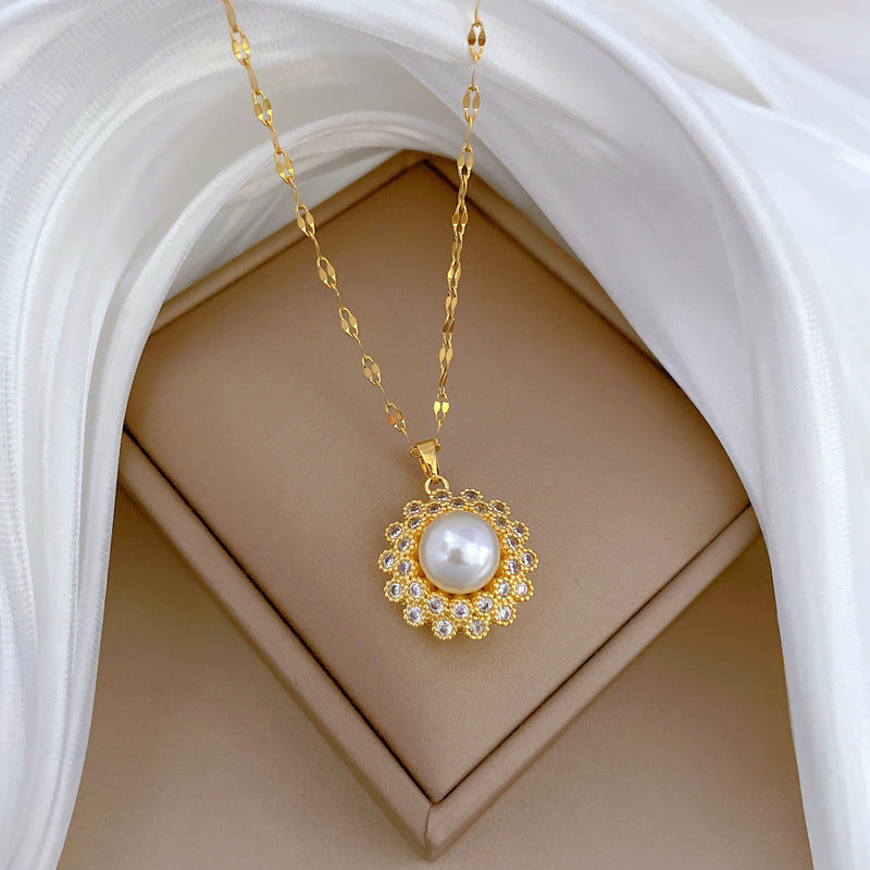 Collana con pendente minimalista a nido con perle e strass in acciaio al titanio con design geometrico per donna e uomo