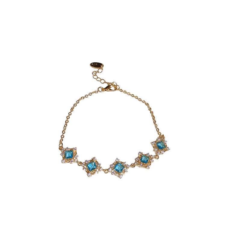 Elegante bracciale geometrico quadrato in zirconia per donna in rame e plastica con inserti floreali, alla moda e minimalista per l'ufficio
