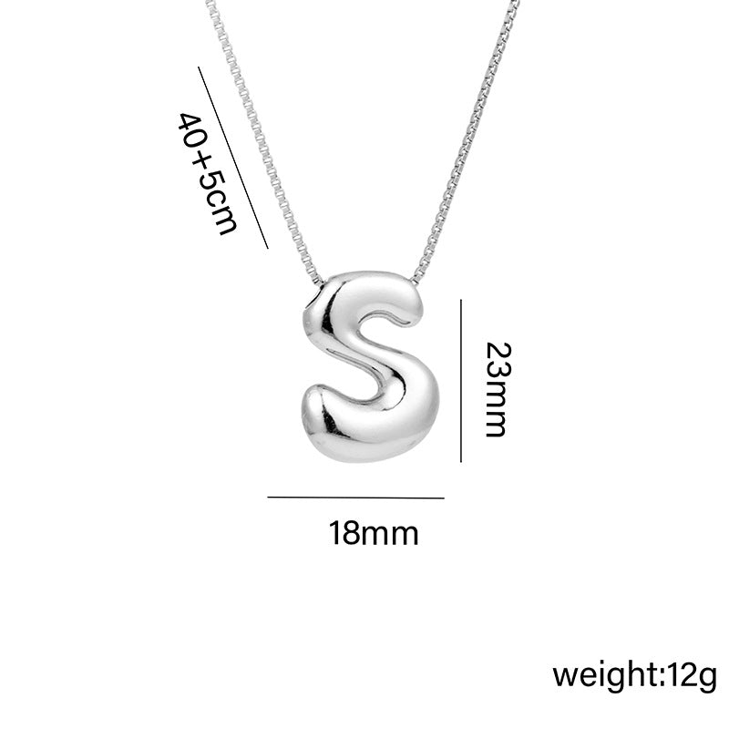 Collar con colgante de acero titanio con forma de letra minimalista y chapado en oro para mujer