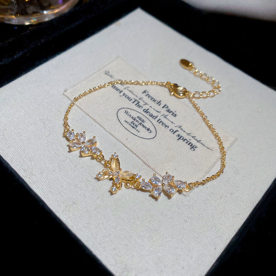 Bracciale da donna placcato oro 18 carati con zirconi a forma di farfalla in stile lusso