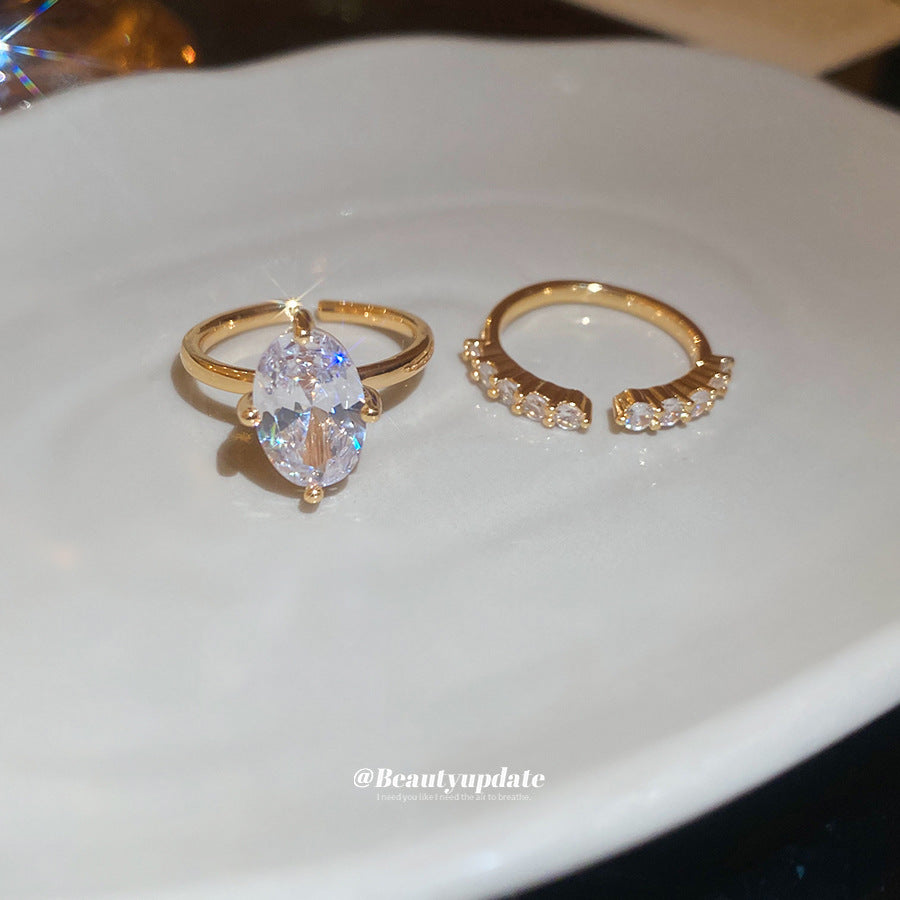 Anello aperto geometrico ovale minimalista di lusso con intarsio in zircone da donna, fascia versatile e alla moda per l'indice