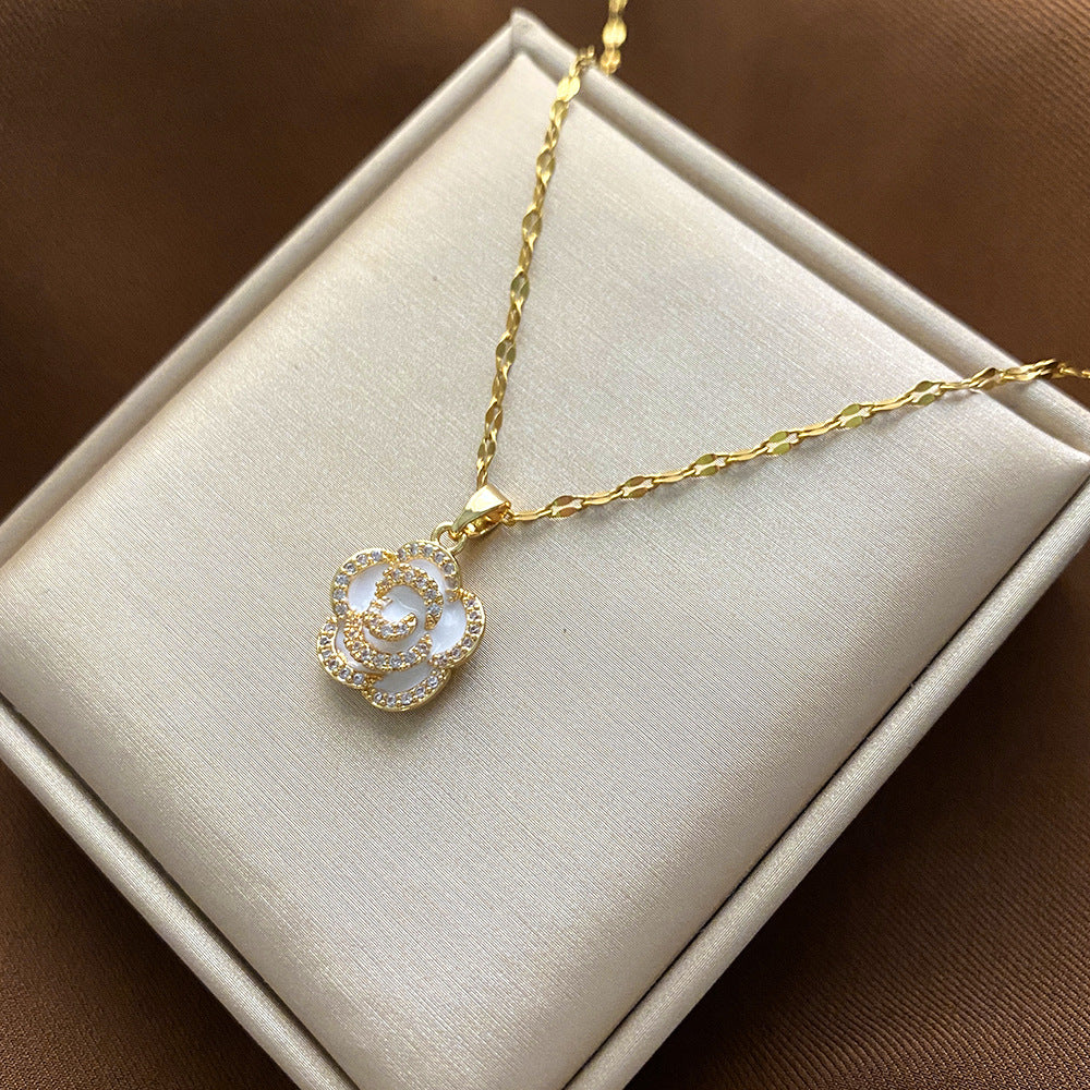 Collana Pendente Floreale Minimalista da Donna e Uomo in Acciaio al Titanio con Finitura Placcata e Catenina a Croce
