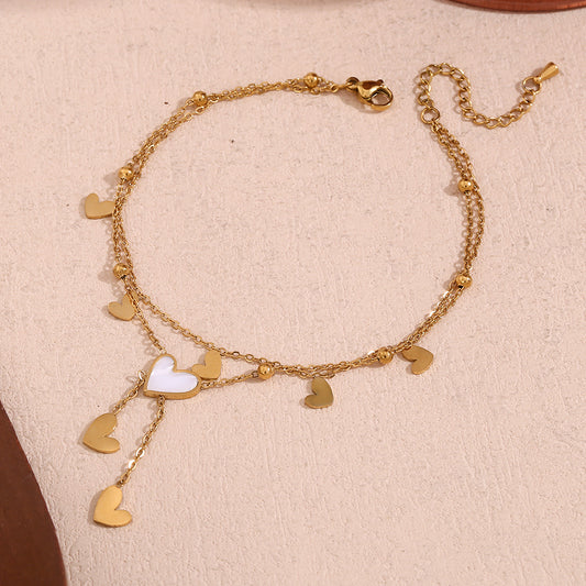 Cavigliera Minimalista a Doppio Strato con Catena in Acciaio Inossidabile, Perline Distanziatrici a Cuore Placcate Oro 18K, Abalone Bianco e Nappe