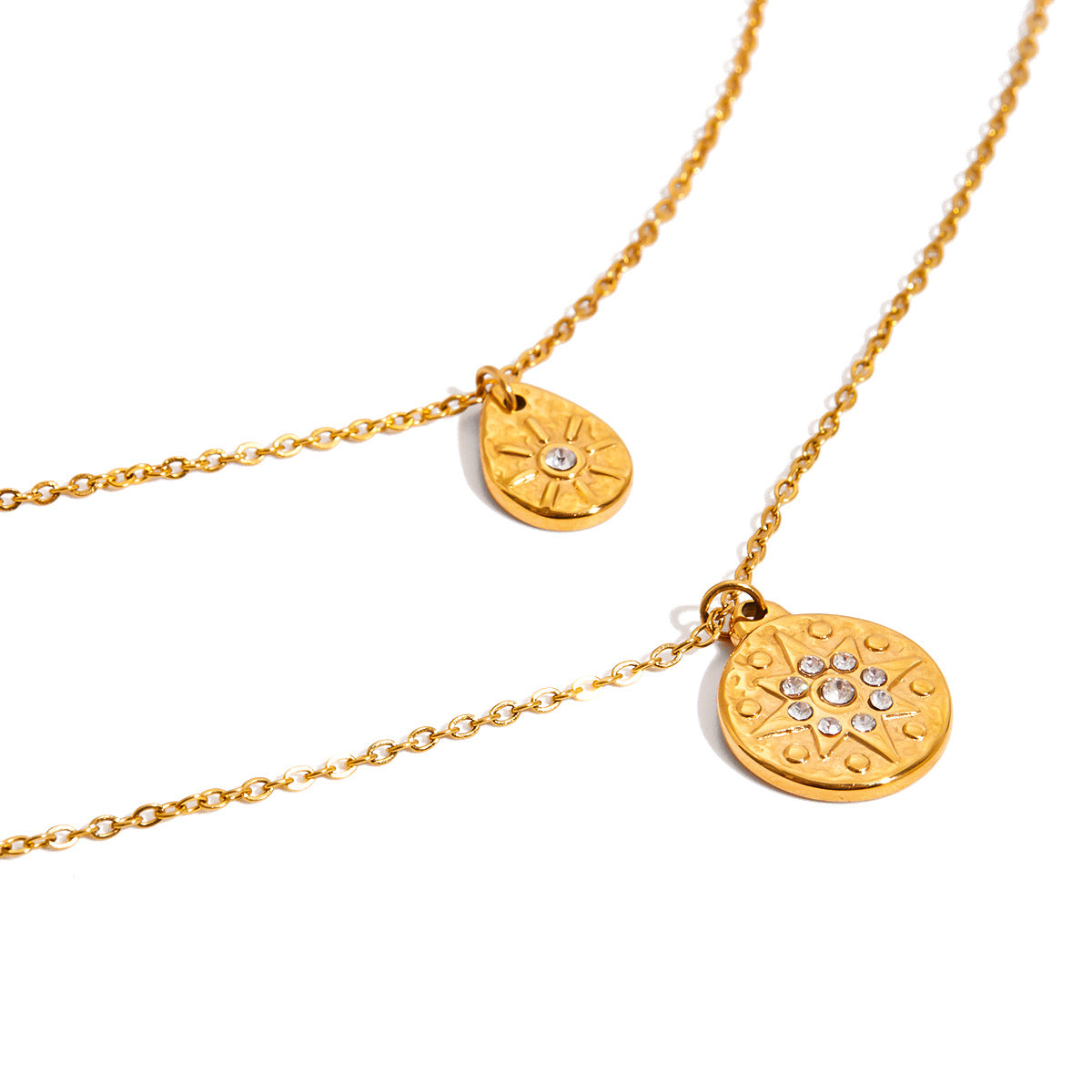 Collar de cadena de clavícula de acero inoxidable chapado en titanio para mujer con colgante geométrico de ráfaga de estrellas y incrustaciones de diamantes de imitación